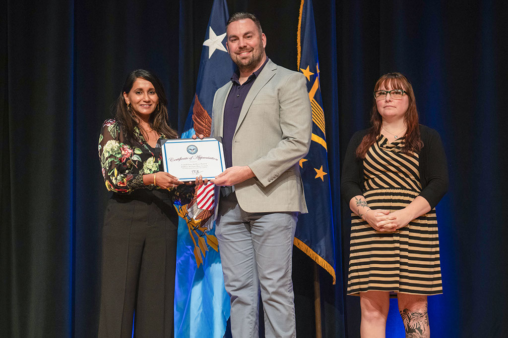 Photo of People Receiving an Award